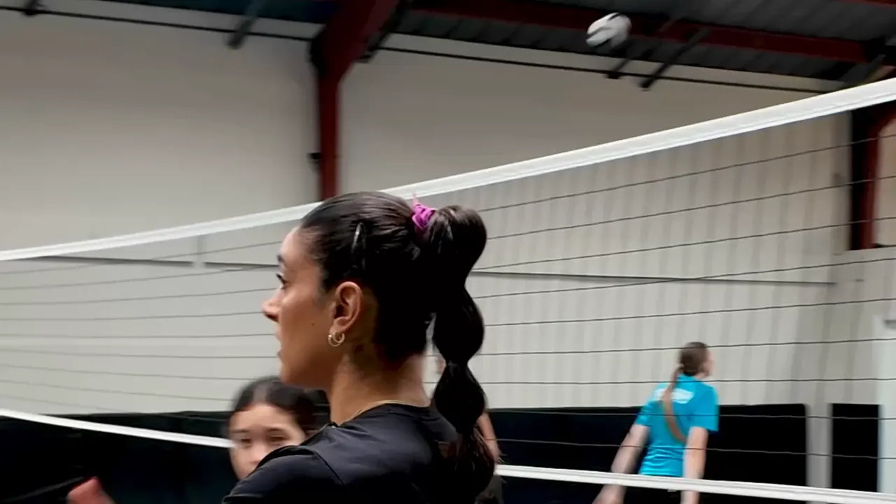 Juliann Faucette, a TVI Trainer, demonstrating for a group of athletes