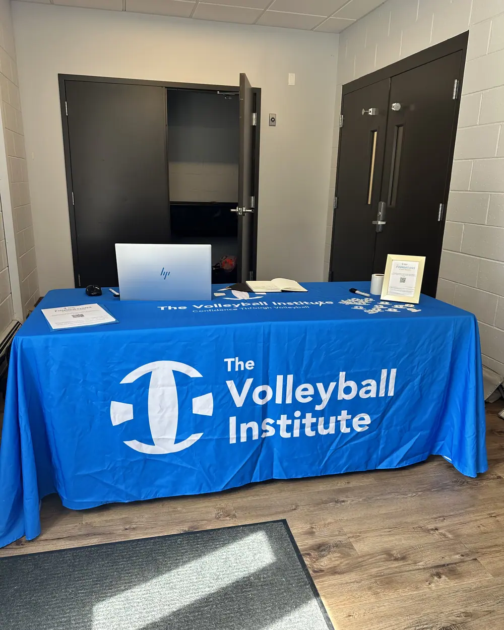 The TVI welcome table set up for families at a free clinic